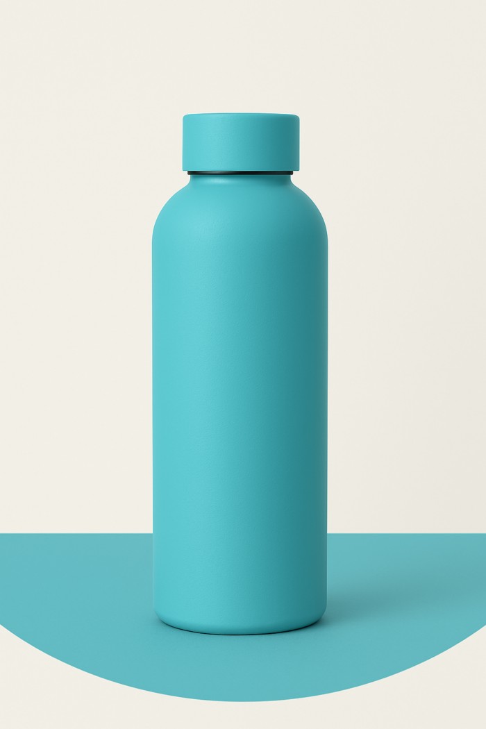 Turquoise stainless steel water bottle with a matte finish, displayed vertically on a dual-tone background of turquoise and off-white.